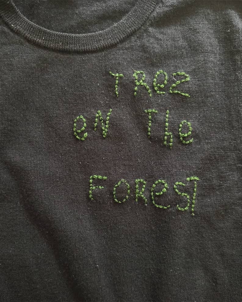 Handwritten art, embroidered.