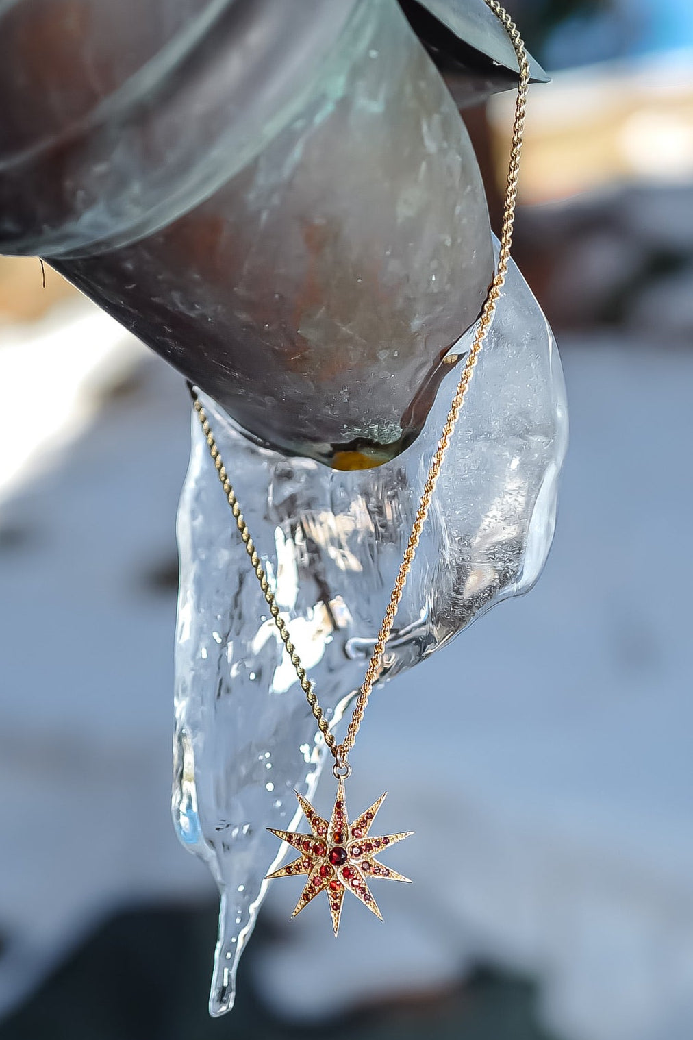 18kt gold antique star necklace.